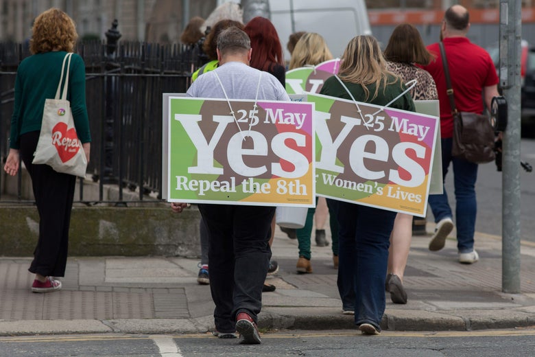 Activists from the 'Yes' campaign, urging people to vote 'yes' in the referendum to repeal the eighth amendment of the Irish constitution, canvas voeters in Dublin on May 24, 2018. - Ireland will hold a referendum on May 25 on whether to alter its constitution to legalise abortion. The Eighth Amendment of the Irish constitution recognises the equal right to life of the unborn and the mother. Abortion is illegal unless there is a real and substantial risk to the life of the mother, and a woman convicted of having an illegal termination faces 14 years imprisonment. (Photo by BARRY CRONIN / AFP) (Photo credit should read BARRY CRONIN/AFP/Getty Images)